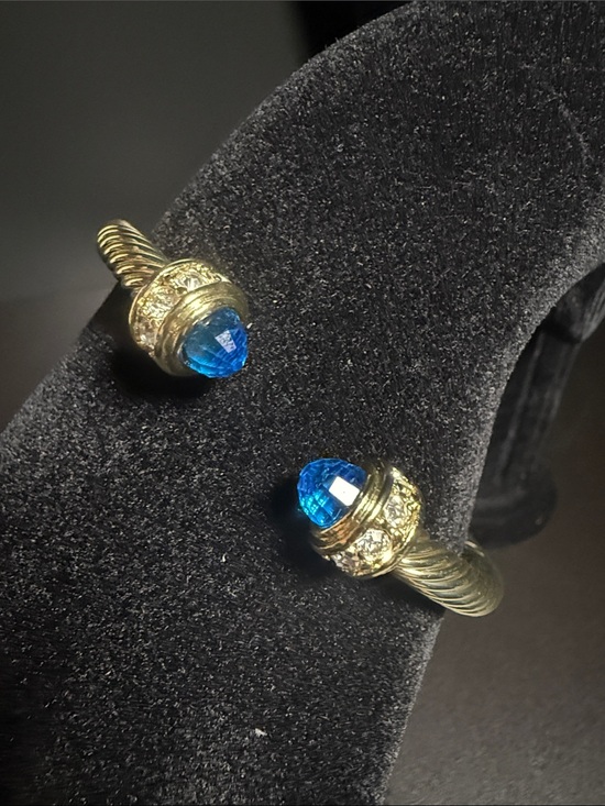 Jewelry - Gold-Tone Twist Cuff Bracelet with Blue Crystal Finials